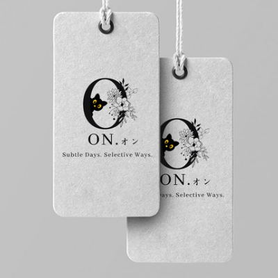 森白視覺為ON日系選物店設計的極簡 Logo 森白視覺設計的名片作品，溫柔風格，以O字手繪貓咪從O字窺探，旁邊有花卉元素點綴